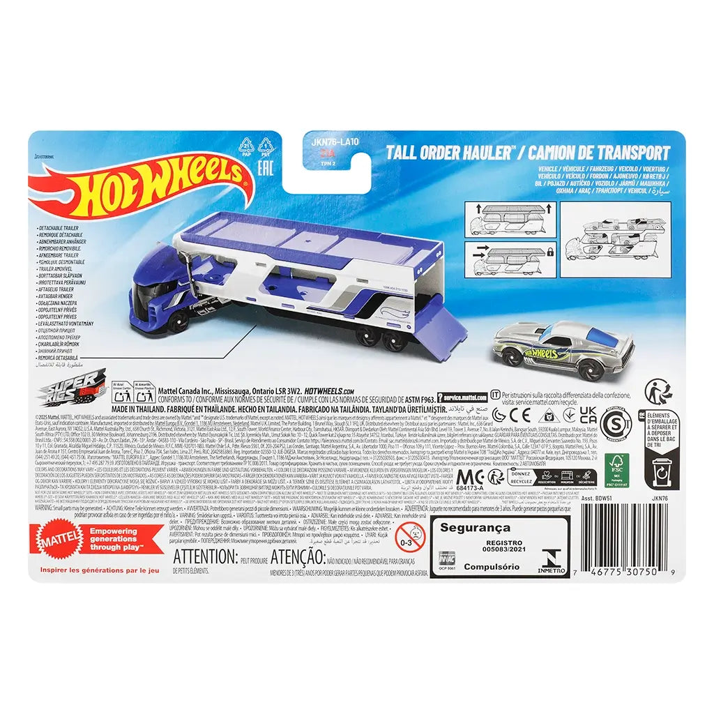 Hot Wheels Tall Order Hauler packaging back view with blue card backing, play feature diagrams, detachable trailer instructions, safety warnings, multilingual product text, certification icons, and Mattel branding.