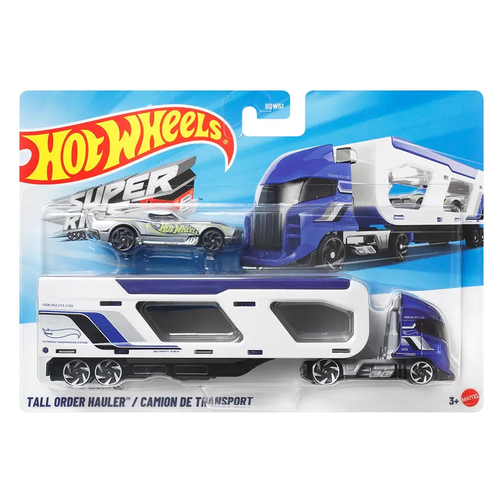 Hot Wheels Tall Order Hauler Super Rigs set featuring a blue and white plastic transport truck with a tall enclosed trailer, angular window cutouts, rolling wheels, and a silver race car displayed in retail packaging.