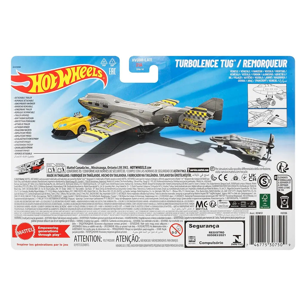 Hot Wheels Turbulence Tug packaging back view with blue card backing, product illustrations, play feature diagrams, safety warnings, multilingual text, barcodes, and Mattel branding.