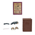How to Train Your Dragon collectible set with Gronckle parts including body, wings, legs, and tail with matching dragon card and brown textured book case on a white background.