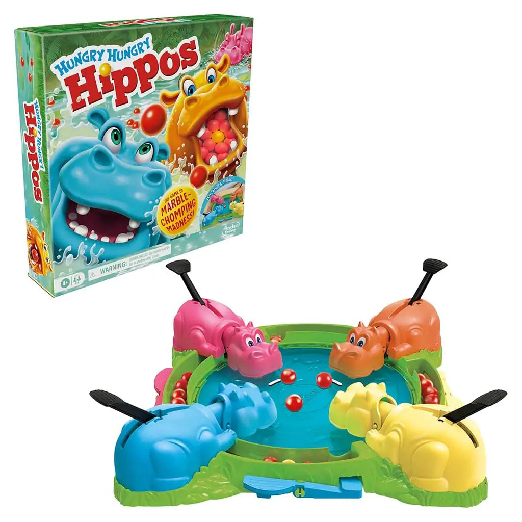 Hasbro Hungry Hungry Hippos box and colorful plastic hippo game set with bright marbles on a green and blue board, emphasizing fast marble-chomping action in a lively tabletop scene.