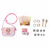 Disney Princess Style Chic Petites playset with small purse, toy bills, lipstick, coins, and keys laid out neatly for display, intended for imaginative play.