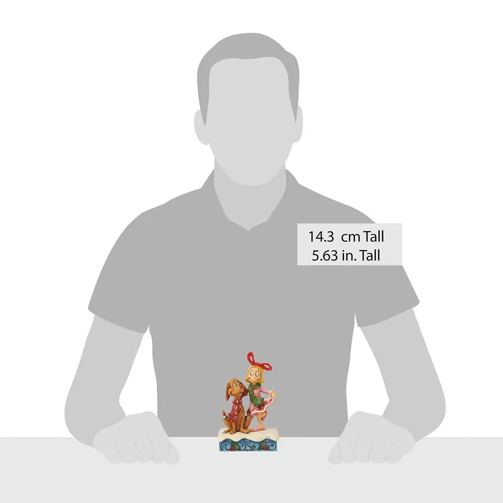 Size comparison image of Jim Shore figurine with Cindy Lou Who and Max, standing 5.63 inches tall, shown in front of a silhouette for scale.
