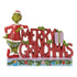 Front view of Jim Shore "Merry Grinchmas" figurine with the Grinch leaning on red block letters, decorated with holly, a present, and festive base.