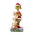 Front view of Jim Shore's Grinch figurine in Santa costume holding a long “naughty or nice” scroll with names, standing on a colorful Christmas-themed base.