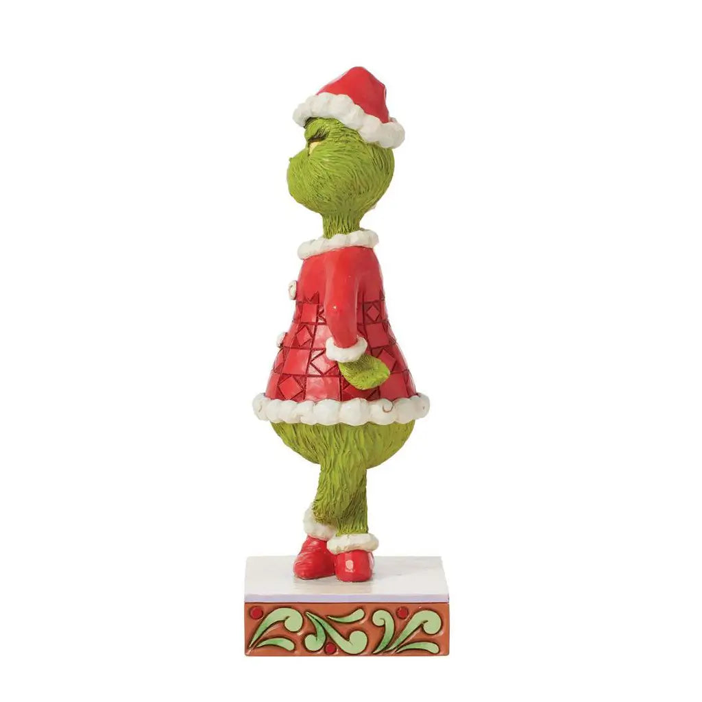 Opposite side view of Grinch figure in classic red Santa attire, sculpted details and festive patterns on a square holiday-themed base by Jim Shore.
