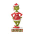 Front view of Grinch figurine in Santa costume with hands on hips, green fur texture, and detailed base; festive Jim Shore holiday collectible decor piece.