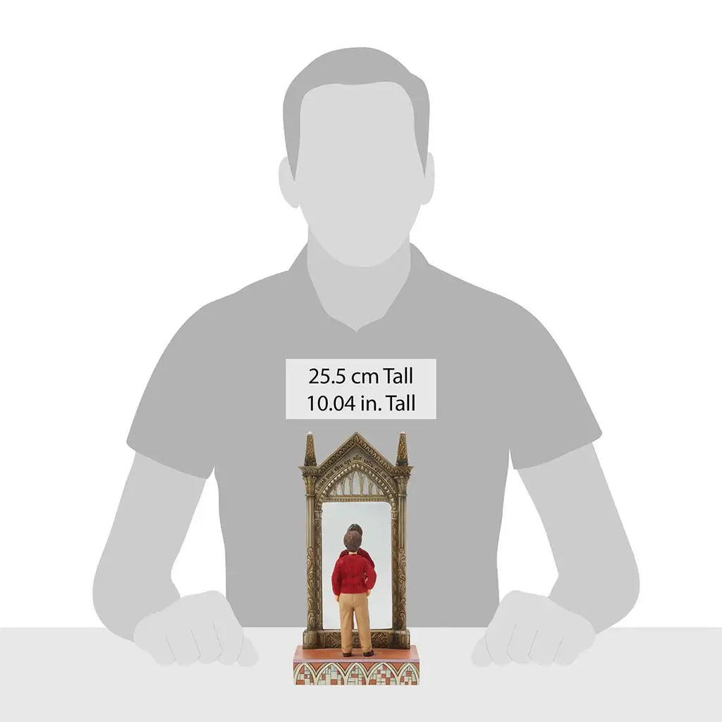 Figurine of Harry Potter by Jim Shore measures 25.5 cm tall, depicting Harry in red sweater looking into the golden Mirror of Erised with gothic frame.