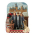 Front view of Jim Shore Harry Potter figurine with Hogwarts castle background, trio in robes, Sorting Hat on wooden stool, red train, and Gryffindor crest detail.