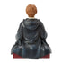 Rear view of Jim Shore Ron Weasley figurine, highlighting textured carved folds of dark blue robes and reddish-brown hair, with maroon checkered base visible.