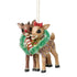 Three-quarter view of Jim Shore Rudolph and Clarice ornament, showing folk art carvings, holiday scarves, and a bright green tinsel wreath.
