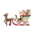 Side profile of Jim Shore Rudolph pulling Santa’s sleigh, highlighting green scroll trim, toy details, and intricate painted designs.