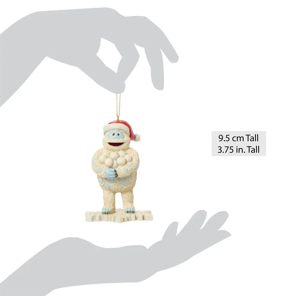 Scale view of Jim Shore Bumble ornament, measuring 3.75 inches tall, with intricate hand-painted textures and snowflake-shaped base.