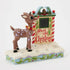 Angled view of Jim Shore Rudolph countdown figurine, showing festive striped calendar frame, red lettering, and folk art detailing on reindeer and base.