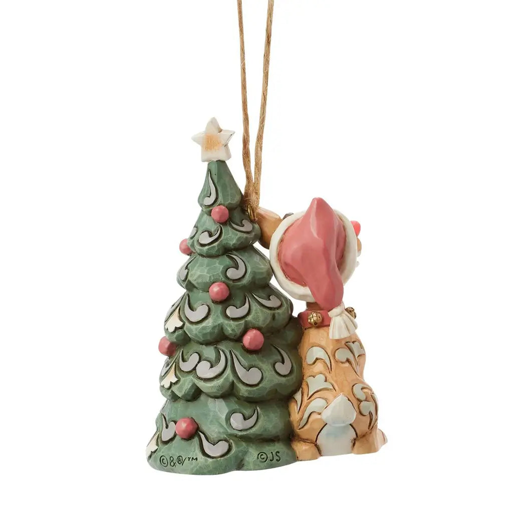 Back angled view of Jim Shore woodland Rudolph ornament, showing decorated tree with star topper.