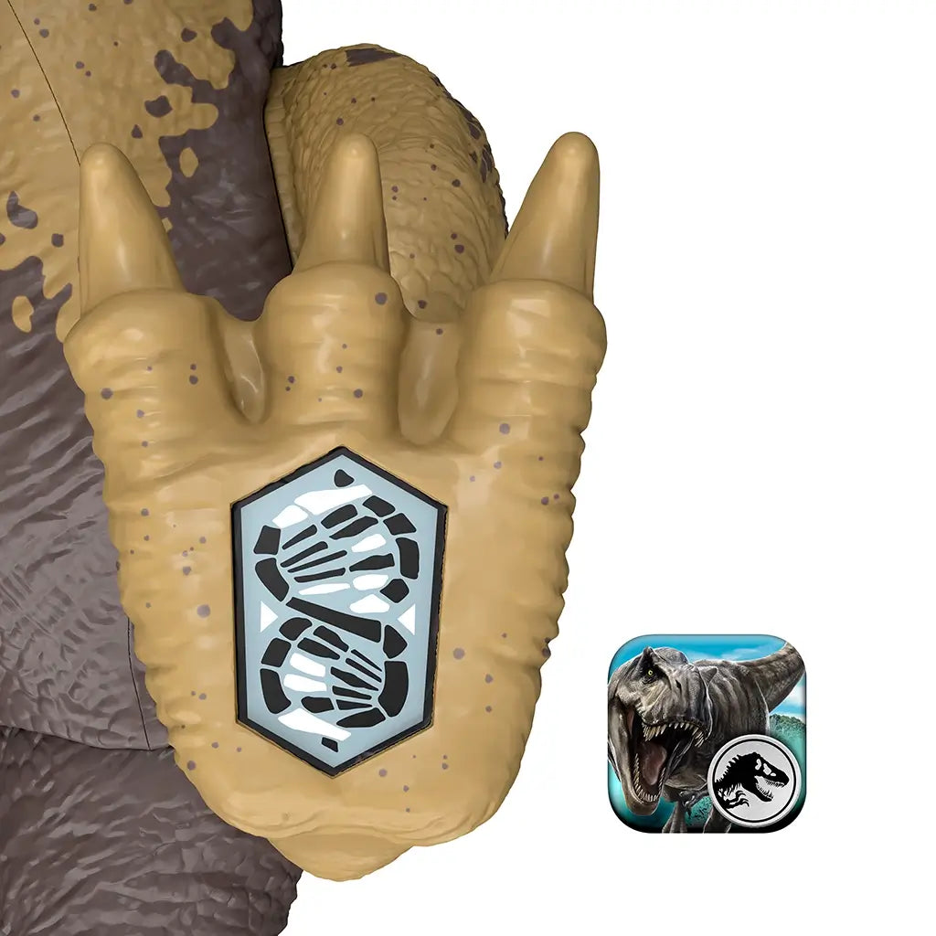 Jurassic World Herrerasaurus toy foot in tan molded plastic with an embedded scan code panel, shown in close detail to highlight the Scan and Collect interactive feature against a clean white background.