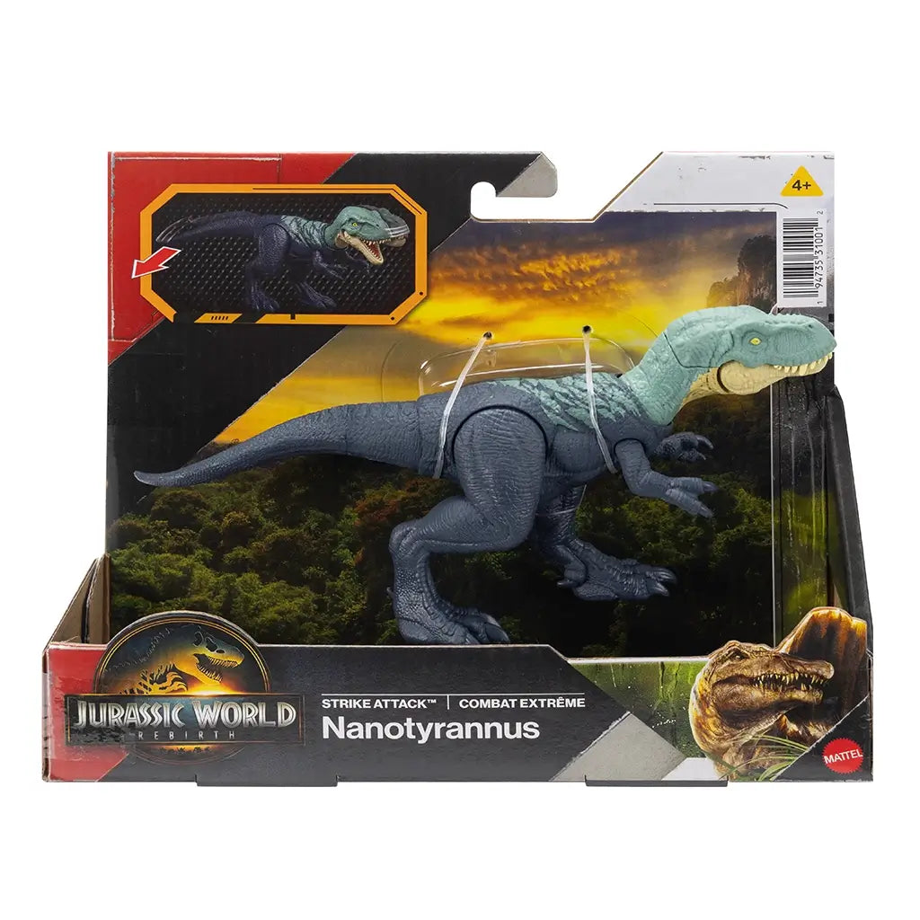 Jurassic World Rebirth Nanotyrannus Strike Attack toy shown in retail packaging with illustrated jungle scenery, dark blue dinosaur figure secured inside, bold branding, age label, and product name visible on the front.