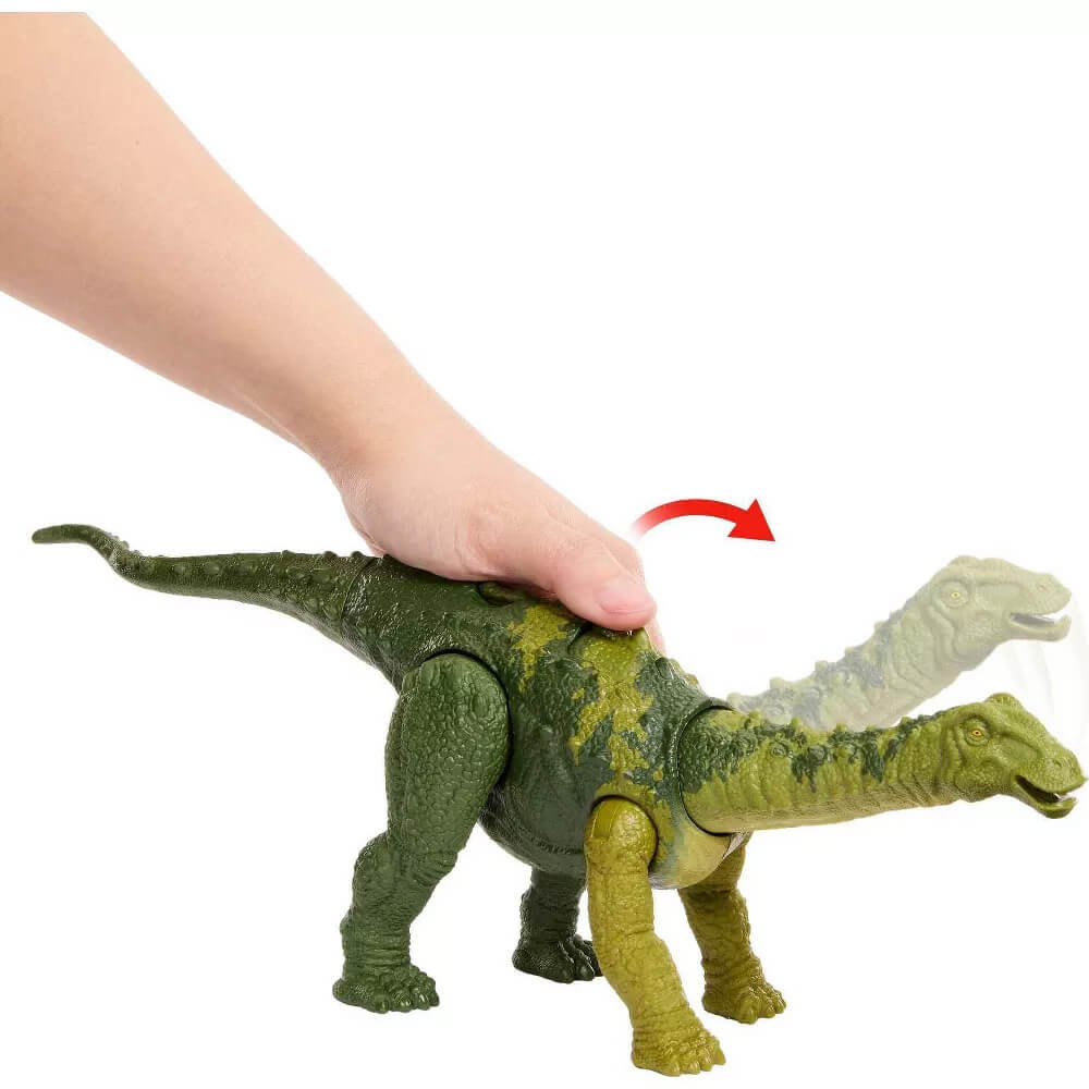 hand pushing button on the Jurassic World Wild Roar Nigersaurus Dinosaur Figure