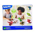 Back of Kidoozie Build Your Own Dinosaurs box shows children playing with screw-together dinosaurs, product features like moving parts and rolling wheels, and safety warnings.