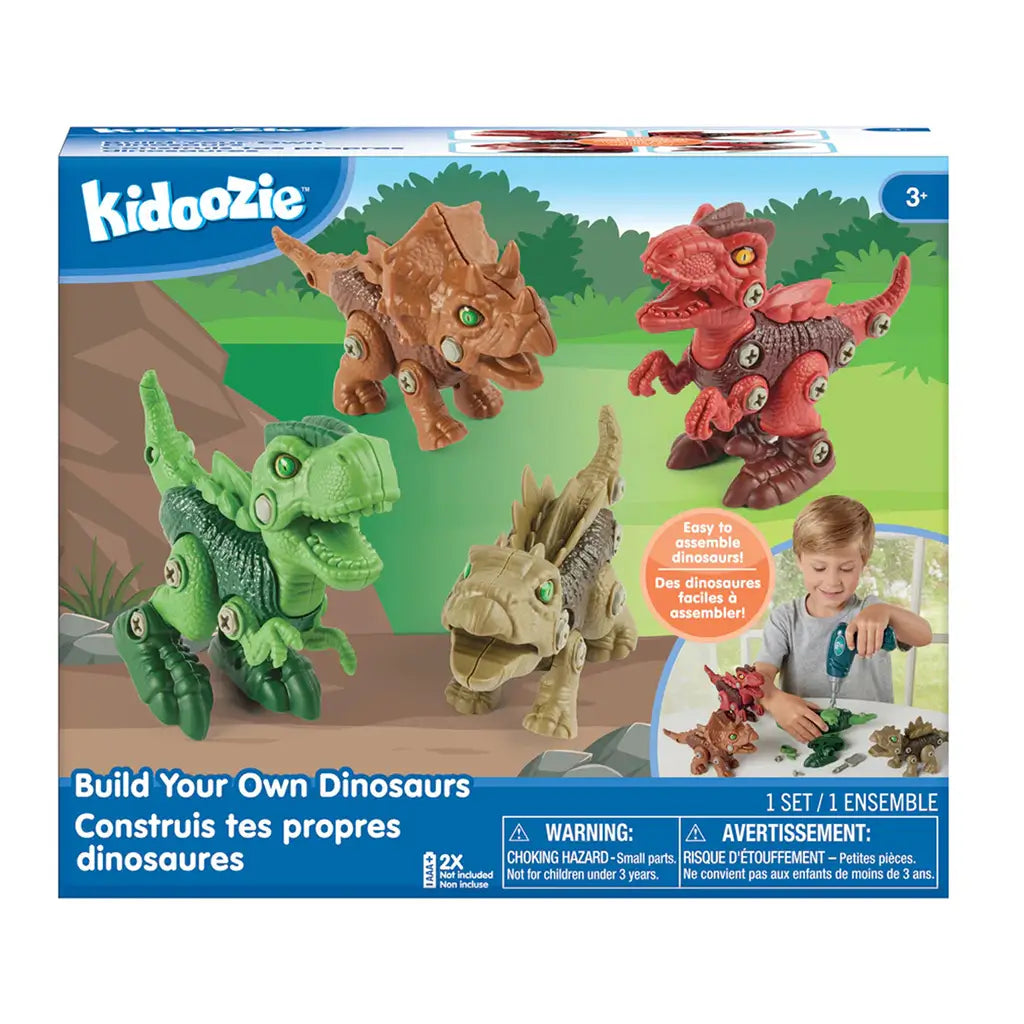Kidoozie Build Your Own Dinosaurs toy packaging box shows four colorful dinosaurs, a child using a toy drill, and bilingual product details in English and French.
