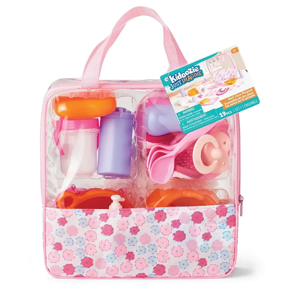 Kidoozie Doll Care Playset in a clear pink floral storage bag includes colorful bottles, pacifier, dishes, and feeding accessories neatly arranged inside with product tag attached.