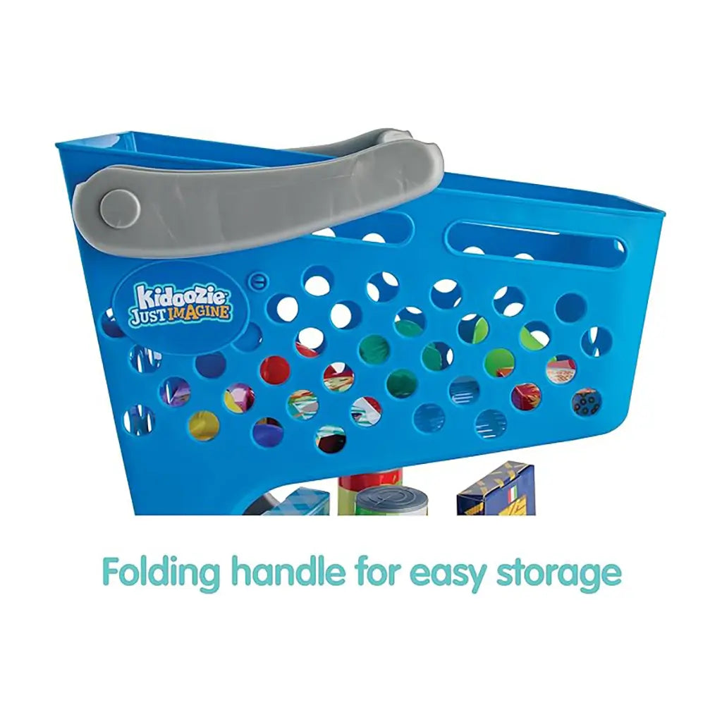 Close-up of blue Kidoozie shopping cart with circular holes and gray folding handle for storage, filled with colorful pretend groceries, against plain white background.