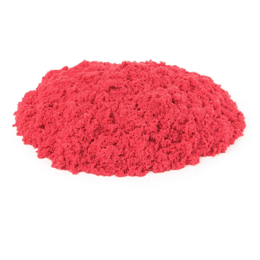 kinetic sand neon red sand bright red soft crumbly texture forming a low rounded mound shape for creative molding and tactile sensory play, displayed on a plain white background