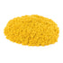 kinetic sand neon yellow sand bright yellow fine crumbly texture forming a soft rounded mound shape for tactile sensory play and creative molding, placed against a plain white background