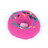 Kinetic sand donut toy in vivid pink soft grain texture with round ring shape, topped with colorful confetti sprinkles, designed as a pretend dessert display on a plain white background.