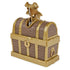Brown and gold Kinetic Sand toy treasure chest with faux wood panels, riveted metallic bands, skull latch, and curved lid, designed for kids treasure hunt play and sand storage on a white background.