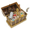 Brown and gold Kinetic Sand treasure hunt playset chest with molded wood texture, metallic trim, and pirate theme, opened to reveal kinetic sand, gems, tools, and hidden compartments on white.