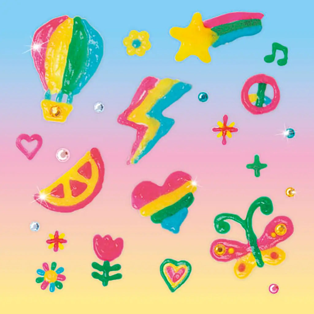 Klutz Jelly Stickers sheet displays multicolored glossy shapes including hearts, stars, flowers and fruit icons arranged on a soft gradient backdrop that highlights their bright, raised jelly texture for crafting fun.