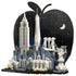 LEGO Architecture New York City model uses black, white, gray and blue plastic bricks to form an apple-shaped skyline with landmark buildings on a white background.