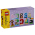 LEGO birthday numbers party decor set in yellow and lavender packaging, featuring animal-themed buildable digits for customizable birthday displays on a clean studio background.