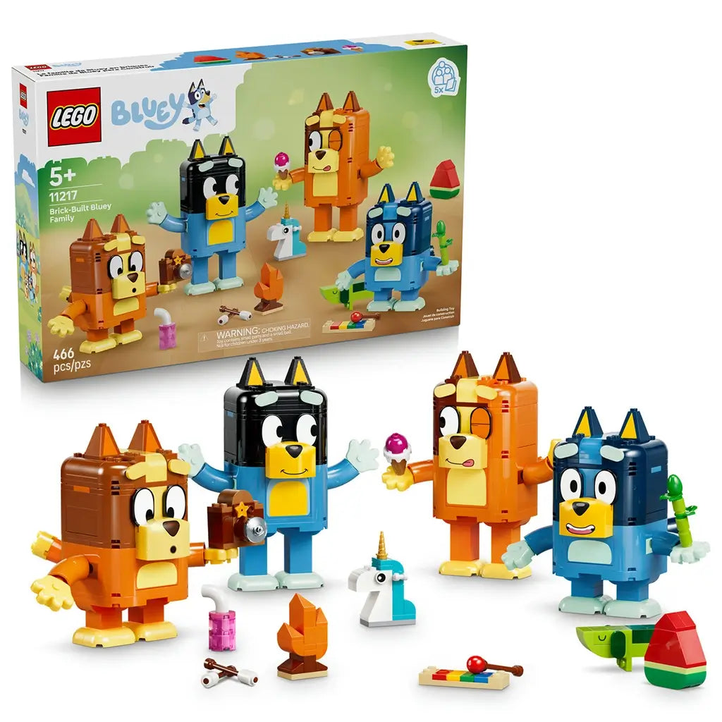 LEGO Bluey Brick-Built Family 11217 pairs the retail box with four blue, orange, brown, and yellow character models and colorful play accessories on a white background.