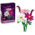 LEGO Botanicals Cosmos Flowers 11514 in pink, magenta, white, yellow, and green plastic are displayed beside the purple 171-piece set box on a white background.