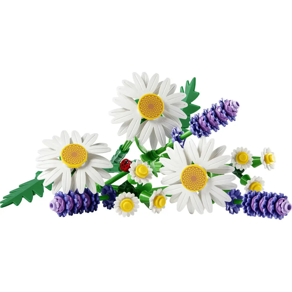 LEGO Botanicals Daisies set featuring white plastic daisy petals with yellow textured centers and green stems, delicate floral shapes for decorative display, arranged as a loose bouquet against a clean white background.