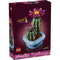 LEGO Botanicals Flowering Cactus box front with deep purple packaging showing green cactus build with vivid pink flower, detailed plastic brick botanical model for decorative display, photographed against a dark studio background.