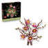 LEGO magnolia branches set includes pink and white plastic flowers with yellow centers on brown stems, styled as decorative floral home decor, shown alongside branded packaging on a clean background.