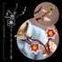 LEGO magnolia branches dimensions graphic shows pink and white plastic flowers on brown stems with measurement diagram and close-up details, illustrating size and design features on a dark background.