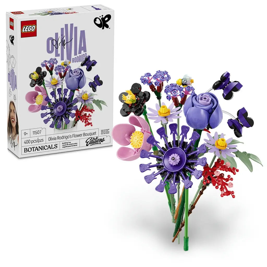 LEGO Botanicals Olivia Rodrigo's Flower Bouquet 11507 pairs its white retail box with purple, pink, red, green, and black brick-built flowers and butterflies.