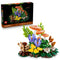 LEGO Botanicals Woodland Mushrooms 11505 pairs its black retail box with an orange, yellow, purple, brown, and green brick-built forest display on a white background.