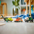 LEGO City rescue vehicles displayed together, including a yellow airplane, orange hovercraft, and green service truck with minifigures, arranged neatly on a light wood floor for completed model showcase.