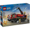 LEGO City Airport Fire Truck box front showing blue branded packaging with a red airport fire engine, working water cannon action, firefighter minifigures, flame elements, and runway background.