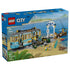 LEGO City Classic Beach Streetcar set 60506 box front in blue shows a turquoise and tan tram, seaside stop, fishing pier, minifigures, dog, seal, and surfboard.