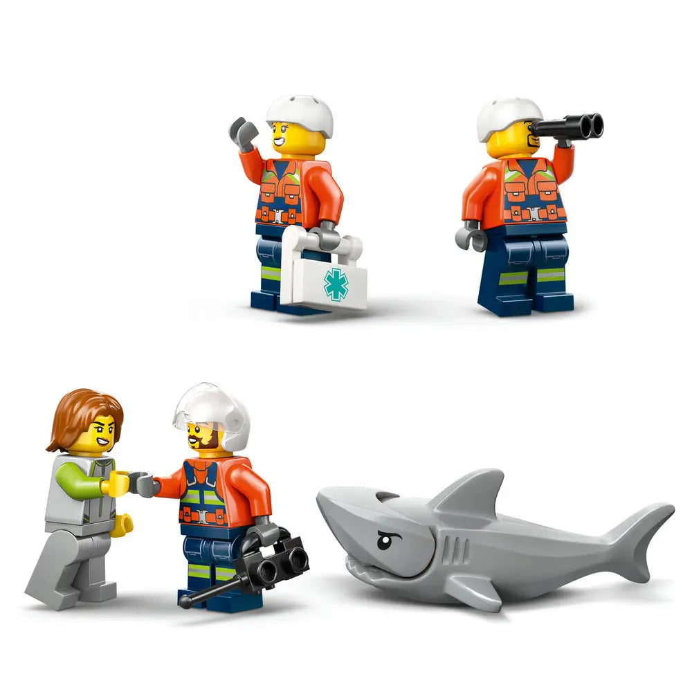 LEGO City Coast Guard minifigures and accessories in bright orange safety gear, including helmets, medical kit, binoculars, and shark figure, shown as character and rescue elements on a white studio background.