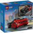 LEGO City EV Supercar package back showing blue LEGO City box with rear view of the black and red electric sports car, play features, minifigure action scene, and illustrated city street background.
