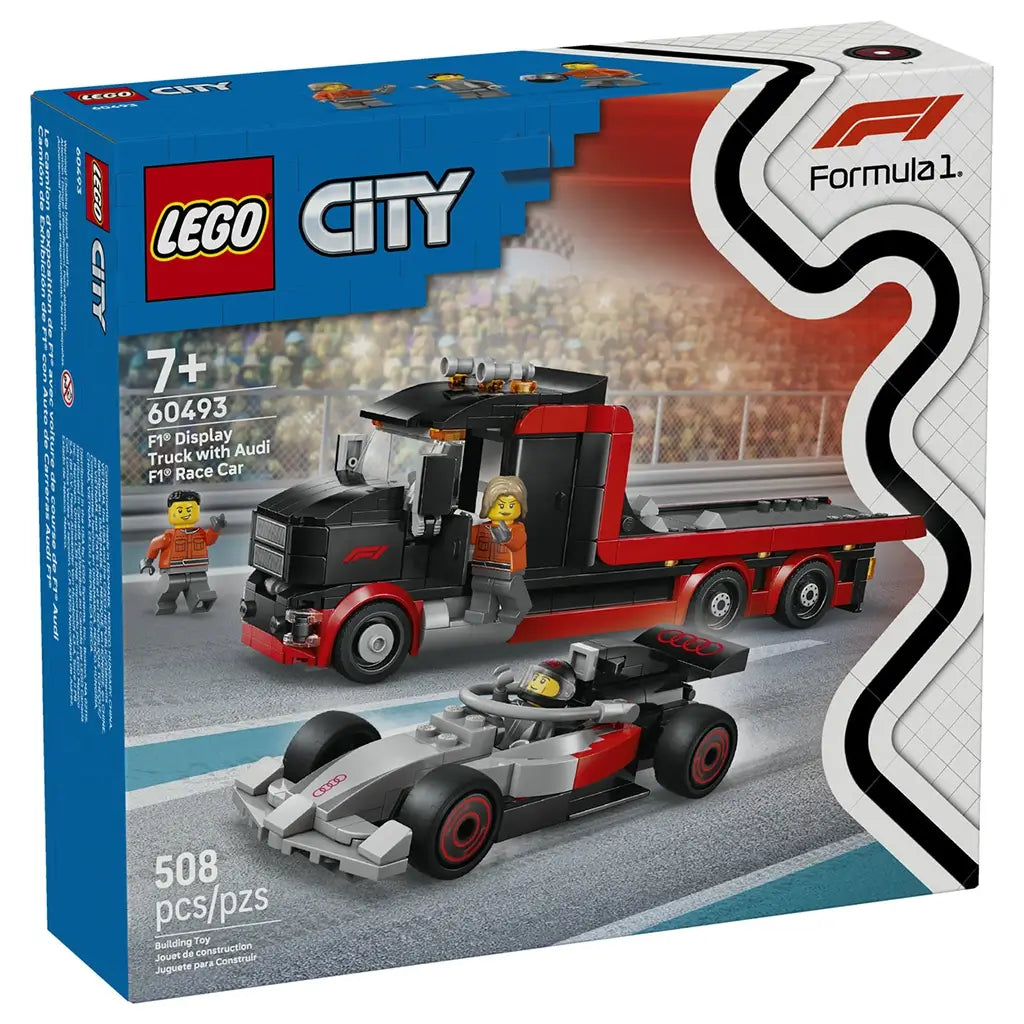 LEGO City F1 display truck set packaging in blue and white cardboard, box featuring red and black transporter with Audi race car, product branding shown on illustrated racing background.