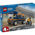 LEGO City Motorcycle Transporter box front showing blue branded packaging with a transport truck, two racing motorcycles, rider minifigures, stadium setting, and age 4+ building details.