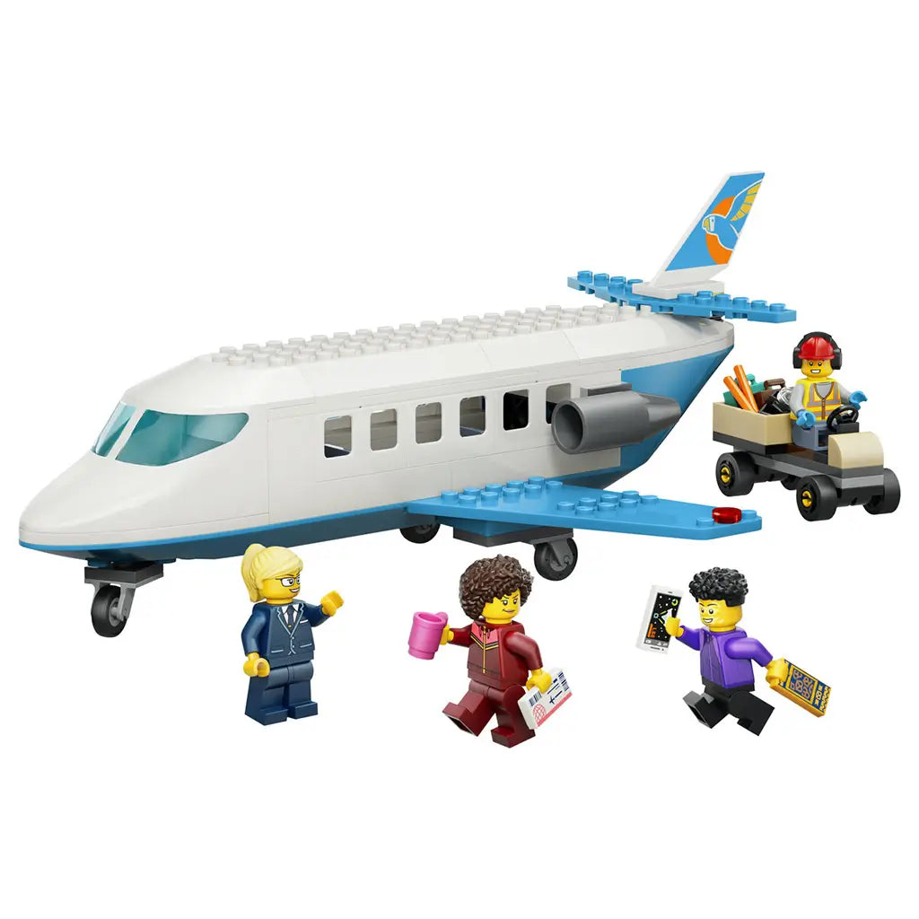 LEGO City Passenger Jet toy set features a white and blue plastic airplane, four minifigures and a baggage cart arranged together on a clean white background.